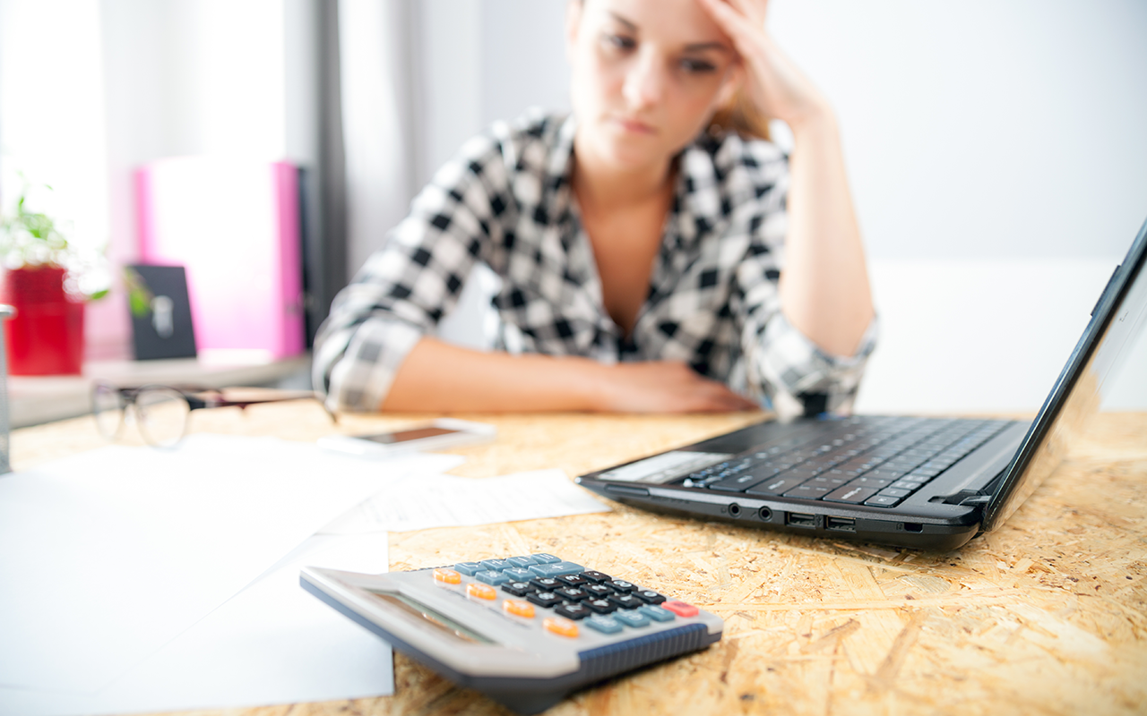 stressed-and-depressed-woman-in-home-office-calcul-2021-08-30-13-47-04-utc